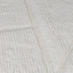 Orryn ivory wool rug edge and textured surface