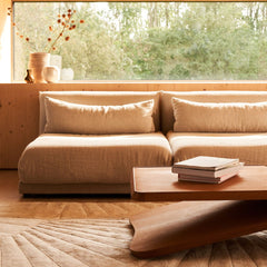 SHELL hand tufted wool rug in a living room