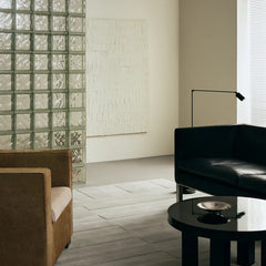 Orriva ivory hand tufted wool rug in a contemporary living room