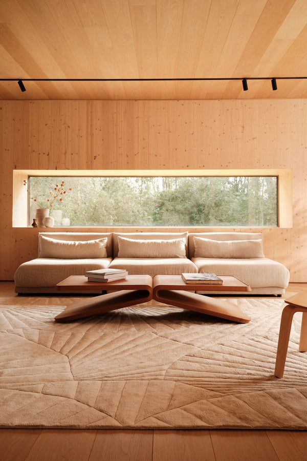 SHELL hand tufted wool rug in a modern living room