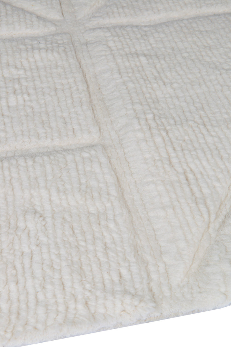 Orryn ivory hand tufted wool rug surface detail