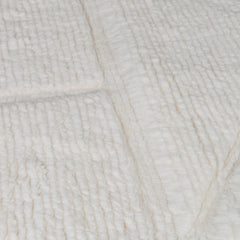 Orryn ivory hand tufted wool rug surface detail