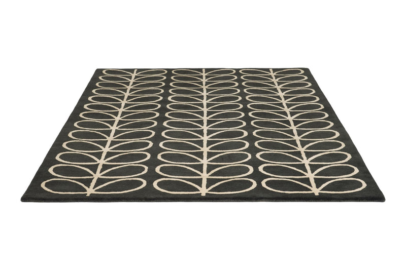 Crown black and cream botanical rug angled view