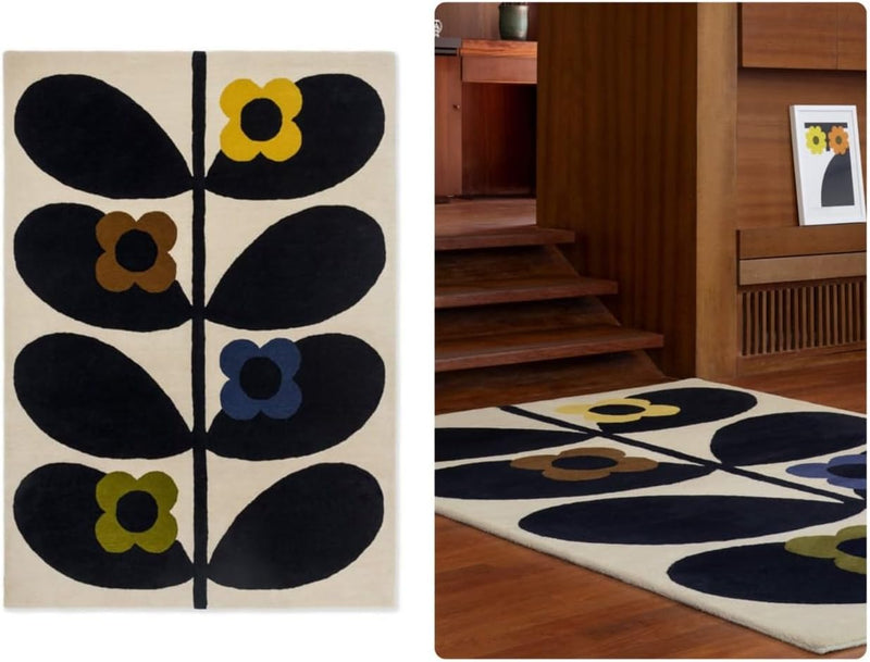 Petal multicolour floral patterned rug with black, yellow, and blue flowers on a beige background wool rug in a room