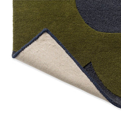 Close-up of Sanctuary green wool rug texture