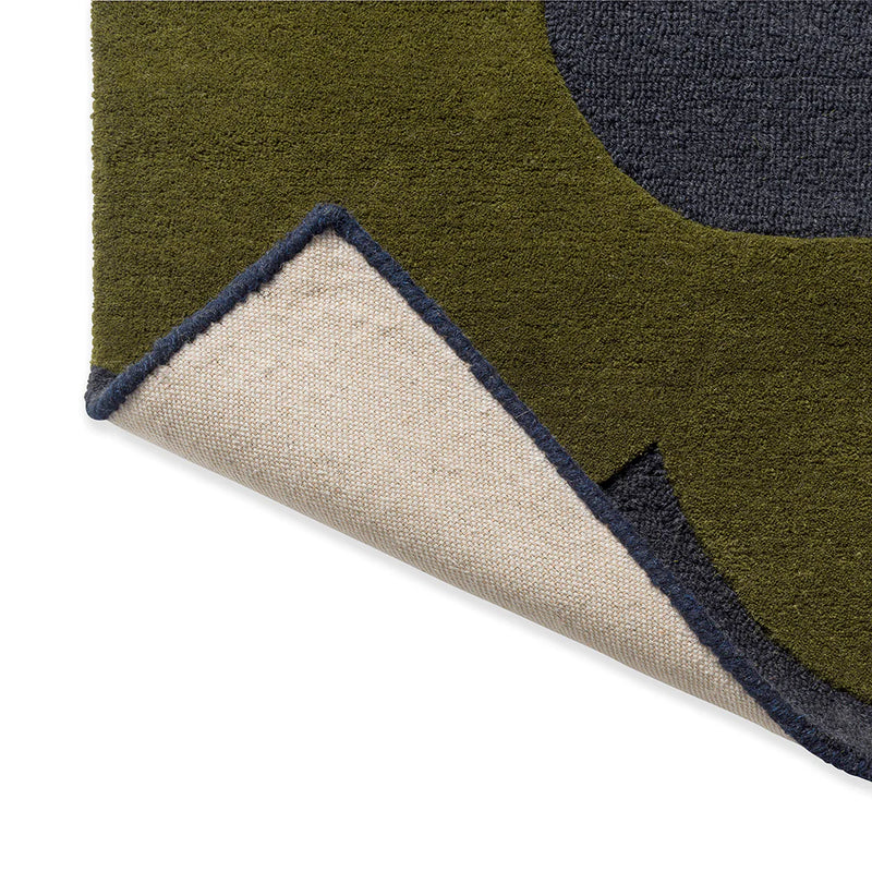 Close-up of Sanctuary green wool rug texture