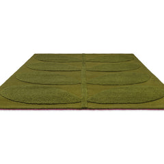 Tropical green leaf rug angled view