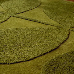 Close-up of Tropical green leaf wool rug texture